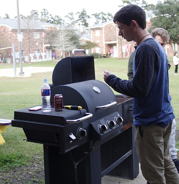 Delts give free barbecue and evening of fun