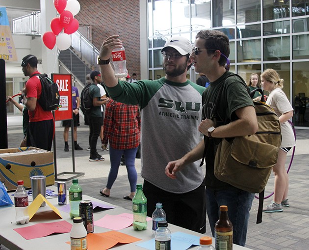 Kinesiology and Health Studies students distribute  wellness information