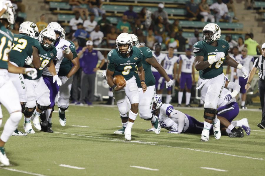 Quarterback Chason Virgil res the ball in an attempt to score on the University of Central Arkansas Bears