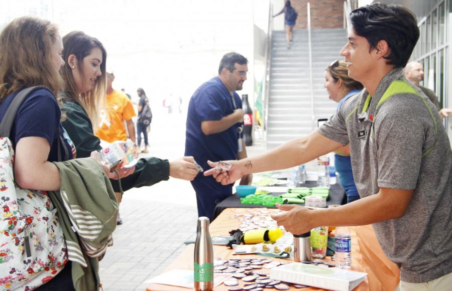 Victor Betancourt, graphic designer for Campus Activities Board, spreads awareness about leukemia for CAB's tabling event.