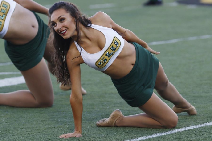 Lionette Olivia Joanos performs a routine for the crowd at Strawberry Stadium. Lionettes and cheerleaders raise Lion spirit for athletic events both on- and off-campus. 