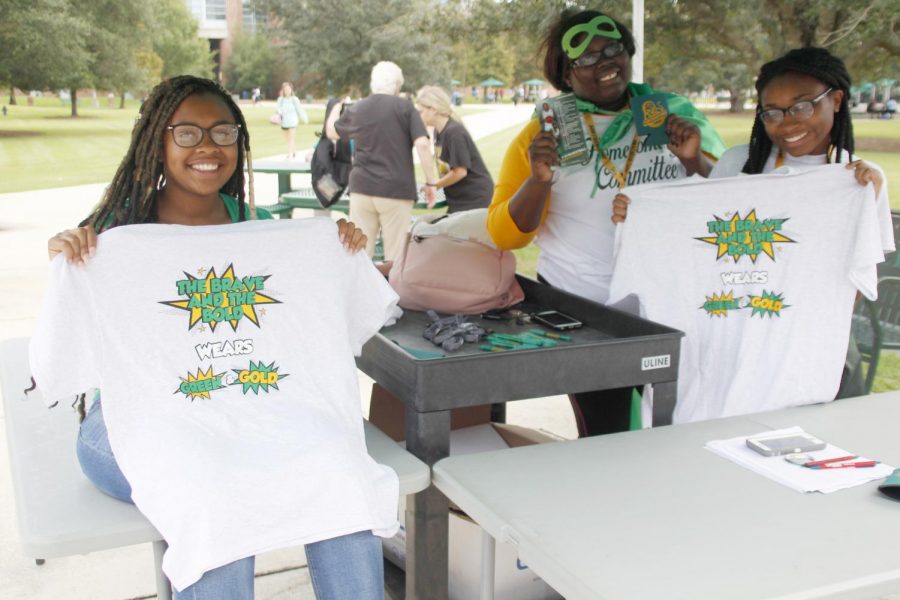 Members of the Homecoming Committee Ricketta Griffin, a junior social work major, Georgette Williams, a senior general studies major, and MiYana Solomon, a sophomore nursing major, gave out T-shirts to students today as a part of Homecoming Week.