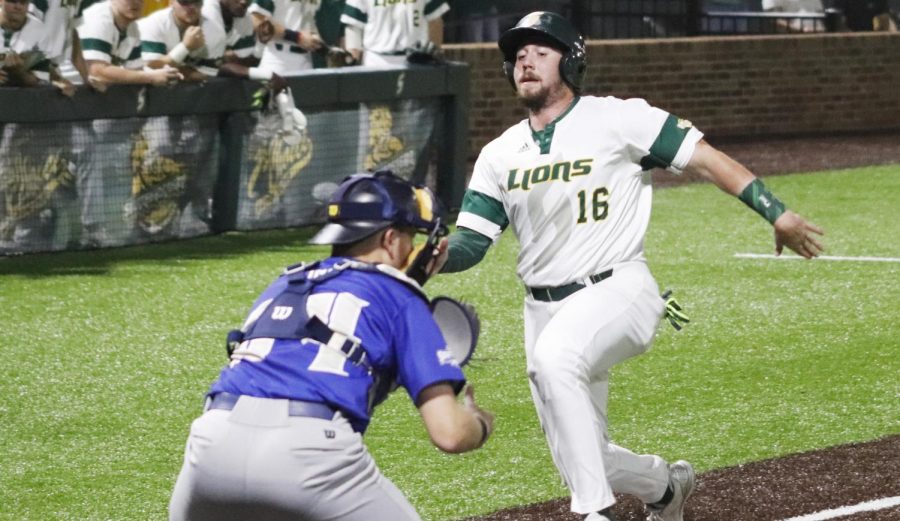 Kyle Schimpf, a senior infielder, runs to home plate to score against the University of New Orleans. Athletes may find inspirations from a number of sources including professional athletes.