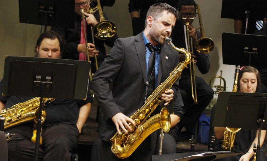 Brad Walker, guest saxophonist, performs with the jazz ensemble at their first concert of the season.