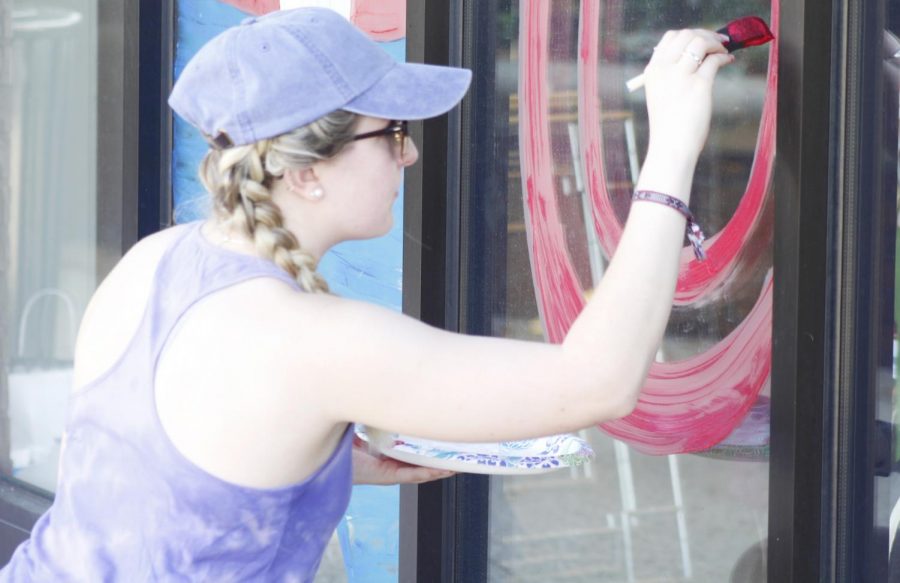 Students painted the windows of various organizations in Hammond to show lion pride. 