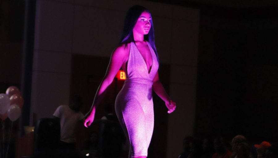 Delta Sigma Theta Sorority, Inc. put on its first fashion show to display the clothing of Jazelle Harris, co-founder of 3's A Charm. 