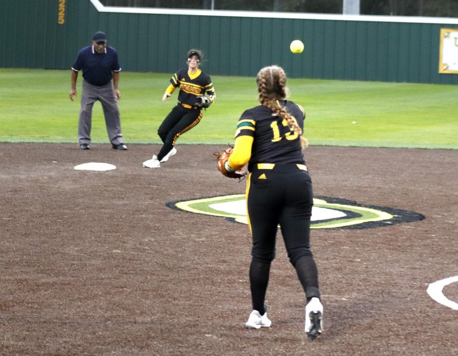 During the game against Prairie View A&M University, Maidson Watson, a sophmore infielder, throws the ball to Jaquelyn Ramon, a senior infielder. The Lady Lions started the tournament 1-0 after a 7-0 win against Prairie View.