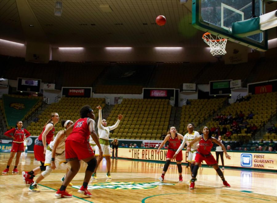 Morgan Carrier, sophomore guard and forward, shoots a free throw during the second half. Carrier scored 15 points during the game, two of which were from free throws.