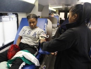 Rwanda Breaux, a sophomore health systems management major, gave blood during CAB's blood drive.