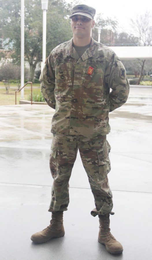 Cadet Christian Mozingo, a senior criminal justice major, stands in his uniform outside the  Student Union Annex. Encouraged to join in high school, Mozingo is thankful for the opportunity to serve his country.  