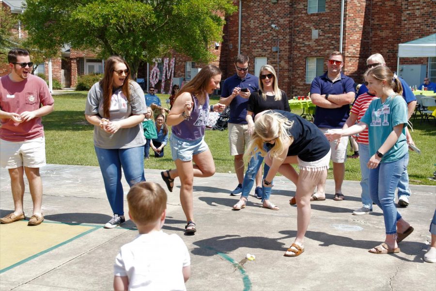 During the afternoon, attendees of Alpha Sigma Taus Backyard Family Day were invited to play an egg toss game.