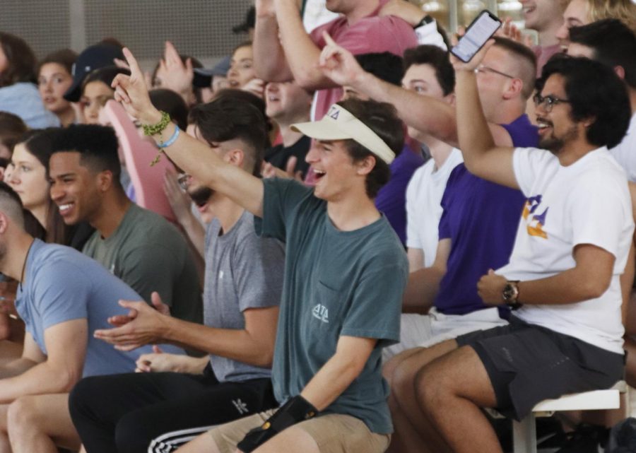 Members of Greek life cheer on their teams. Greek organizations compete in the annual Greek Week through activities like dodgeball and a step show. 