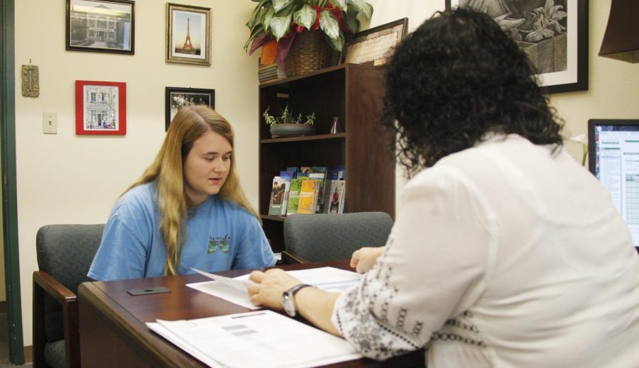 Lindsey Thompson, a sophomore nursing major, speaks with a financial aid counselor about available aid. Students can call or stop by the Office of Financial Aid to learn more about paying for school. 