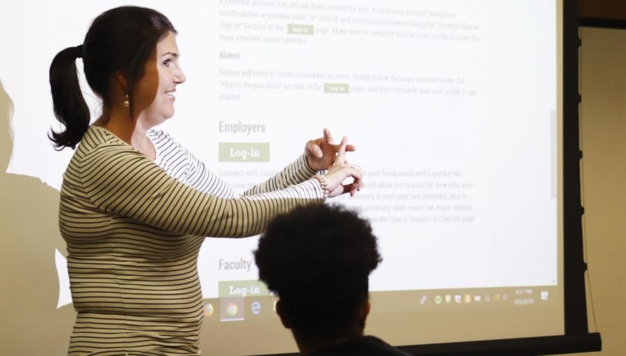 Kim Readlinger, career counselor for the Office of Career Services, talks to students about the importance of being prepared for post-graduation opportunities. Students, alumni and professors may find that getting into the job market takes hard work. 
