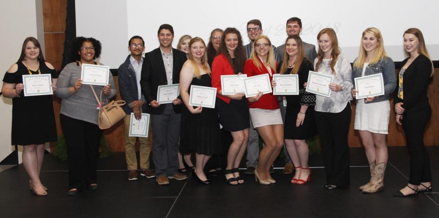 Students pose for a picture after receiving their awards at the 38th “Division for Students Affairs Convocation.” The convocation recognizes students’ achievements every spring. 
