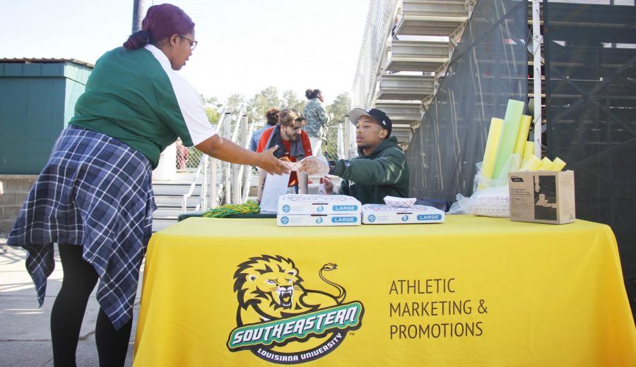“Flood the Field,” a promotion event for the Lady Lions softball game, is an athletics marketing classic. With events like these, the first students to arrive at the game get free pizza and a T-shirt. With proper advertising and promotions, athletics aims to engage with both fans and people who are not interested in sports. 