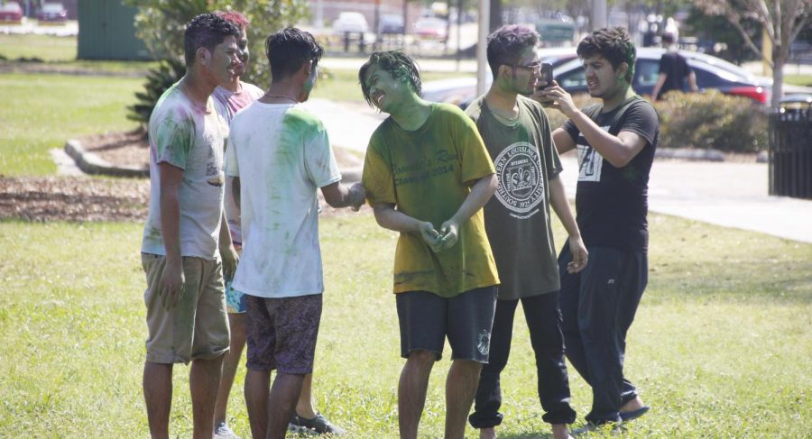 Members of Nepalese Students Association at Southeastern celebrate Holi, a festival of colors, in front of the Pennington Student Activity Center. 