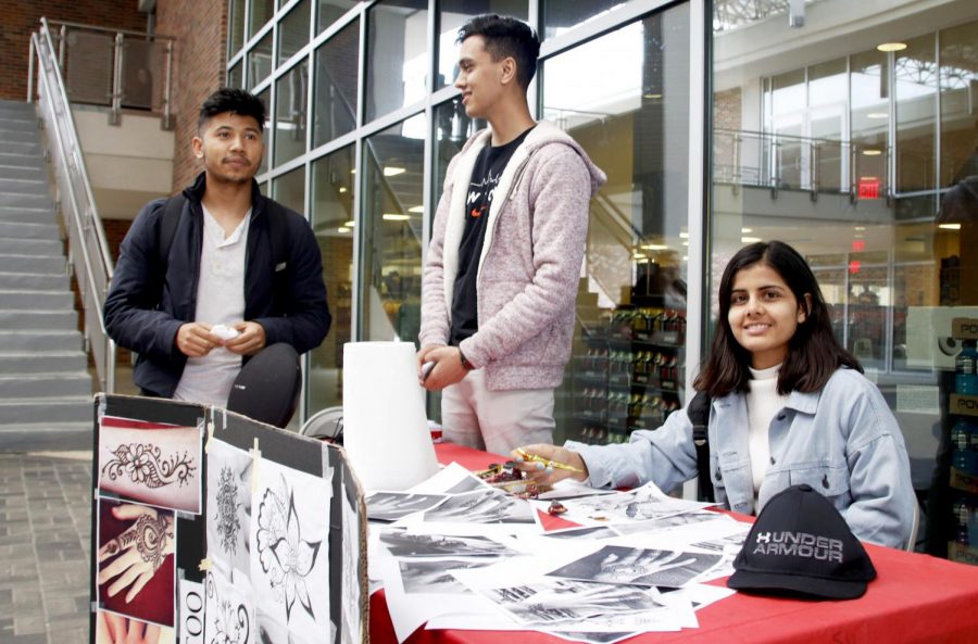 Members of the Nepalese Student Association at Southeastern sell henna tattoos to raise money for their organization. The university has 123 organizations students an join.