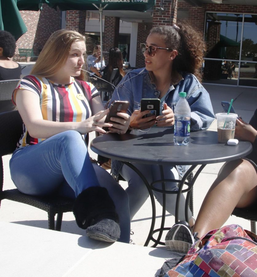 Students share headphones to listen to music. Music is a common study device used by students, but opinions on which music works best differs between people. Research has shown positive outcomes for listening to music while studying. 
