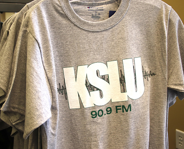 KSLU radio station has started selling merchandise at the University bookstore. Currently, T-shits ranging from sizes small to XL are available for students to buys.