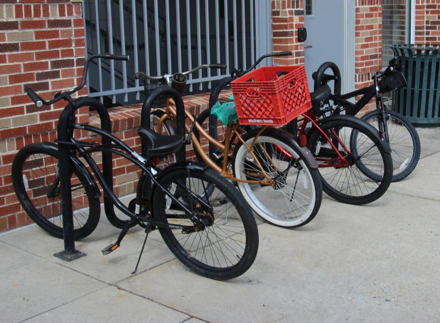 Student’s bicycles are chained to a bike rack outside of St. Tammany Residence Hall. To use a bicycle on campus, students must register their bicycle with the Office of Transportation Services. 