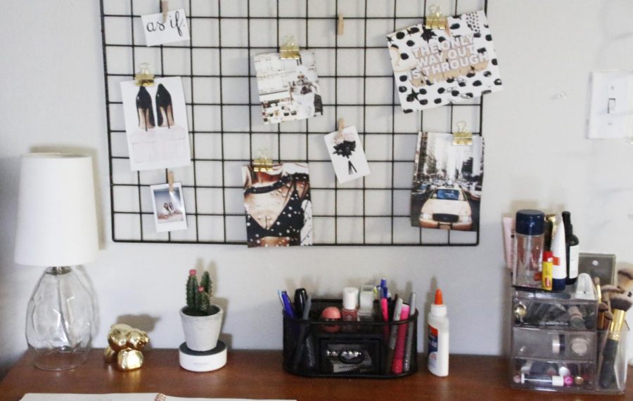 A vision board is displayed in a student’s dorm room. Students can create a vision board to help them achieve their goals and dreams. 