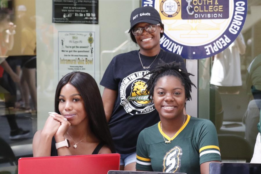 Members of the university chapter of NAACP set up a boot at the War Memorial Student Union Breezeway to spread voting awareness to students. 