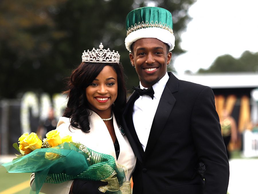 Aesha Magee and Keenan Austin pose for a picture after being announced Homecoming Queen and King. They were crowned during halftime at the Homecoming Game on Oct. 12.