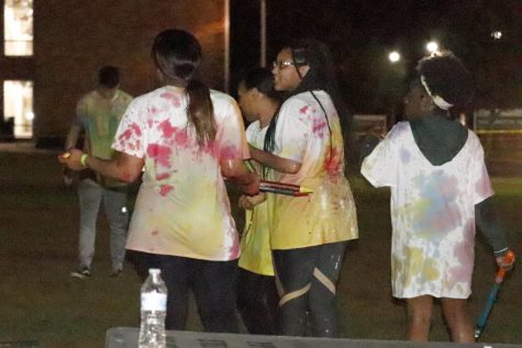 Students have fun playing with paint