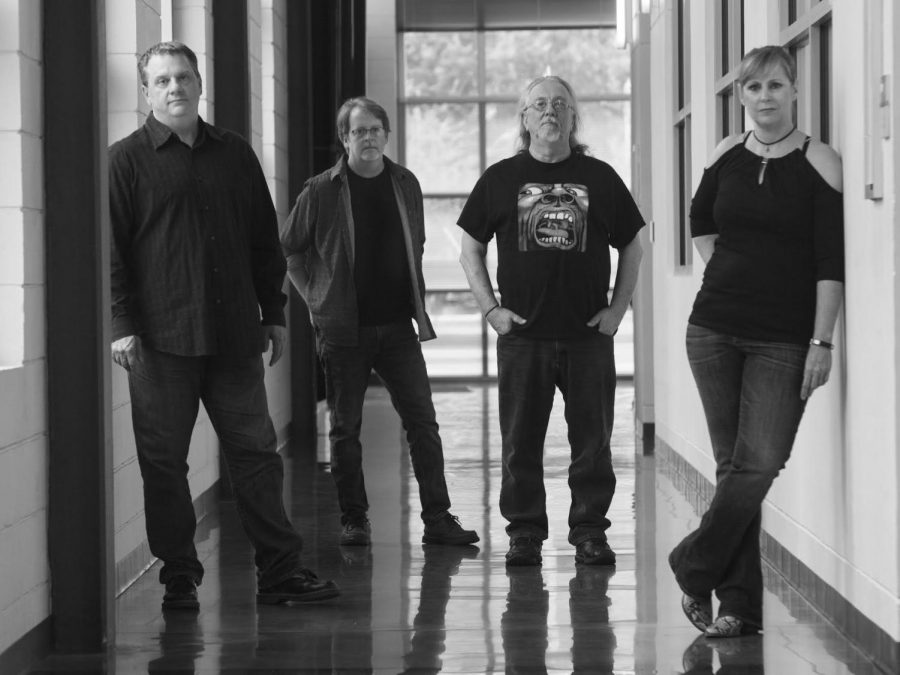Members of the band “Snake Hat” Ralph Wood, Randy Settoon, Bill Robison and Angie Wood are all faculty members at the university. The band alternates between performing cover songs and their own original music.