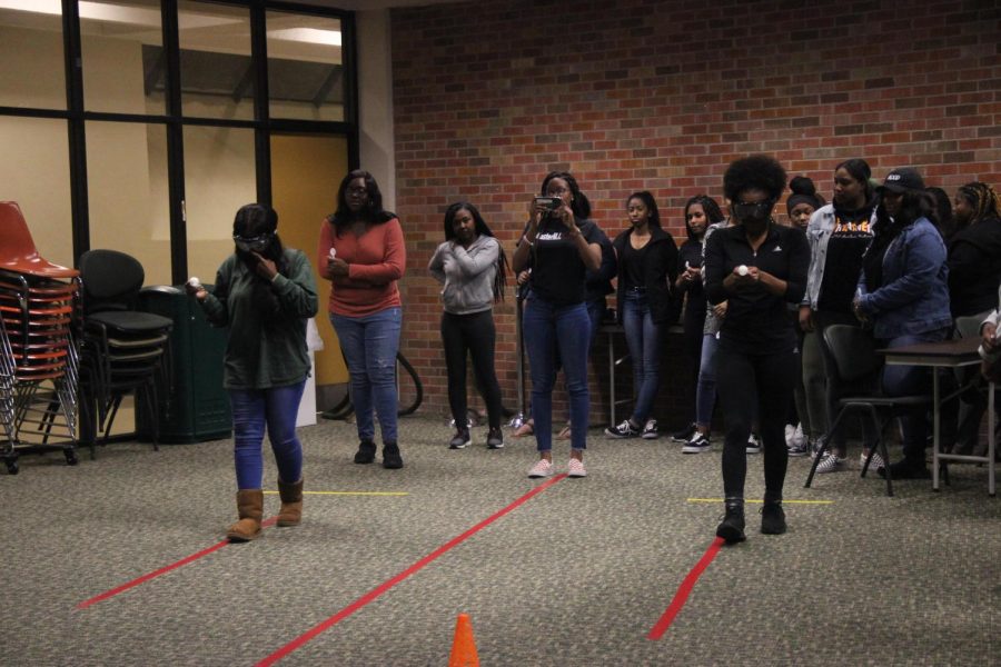 Members of the delta Sigma Theta Sorority perform in a drunk driving road test. 