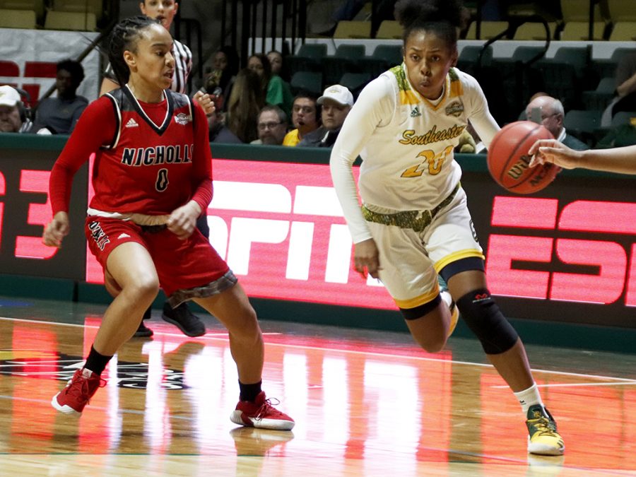 Celica Sterling, a senior guard for the women’s basketball team, dribbles the ball down the court against Nicholls State University. Last season the Lady Lions finished the regular season with a 9-20 record overall. This season the team has four returning seniors and three returning juniors.
