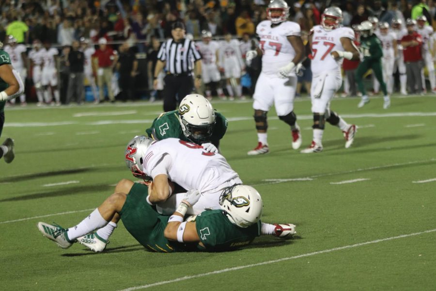 Linebackers Alexis Ramos and Joshua Carr sack Nicholls State quarterback Chase Fourcade. Ramos was ejected in the third quarter due to a targeting penalty in the 2019 loss against the Colonels.  