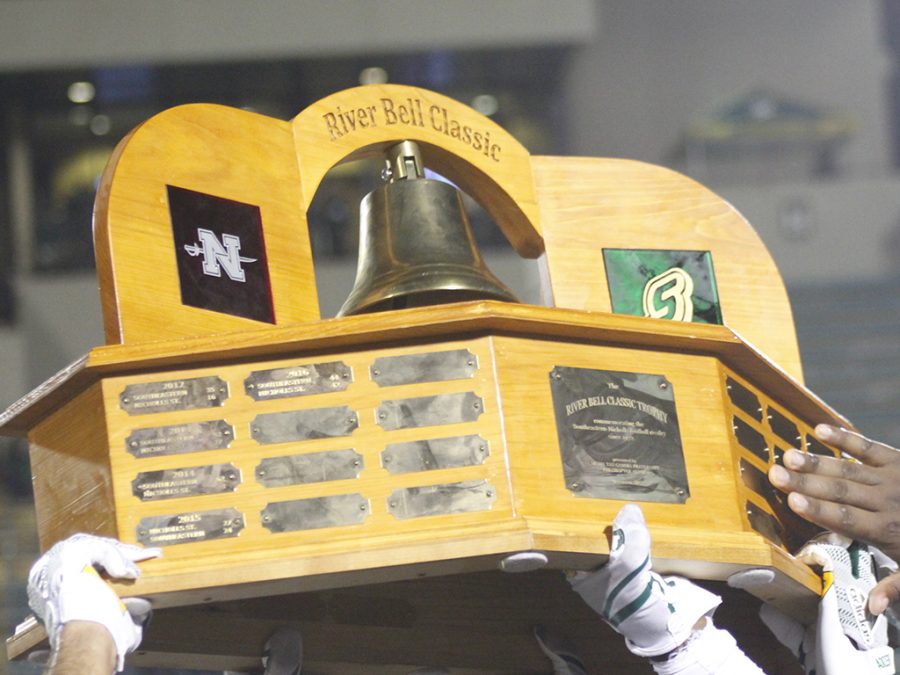 Southeastern football players raise the River Bell Trophy after defeating Nicholls State University 21-17 in 2017. This will be the first time both schools are ranked in the River Bell Classic game. Nicholls and Southeastern will be playing for the Southland Conference title.