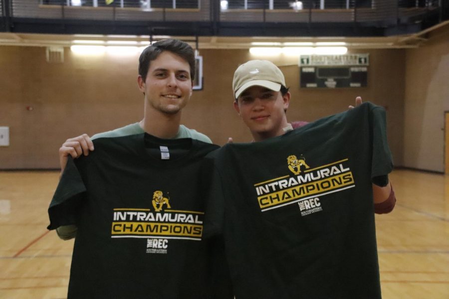 Preston+Gautreau+and+Gavin+Crain+paired+up+to+compete+in+the+universitys+intramural+cornhole+tournament.+They+made+it+to+the+final+round+and+won+the+intramural+champion+t-shirts.