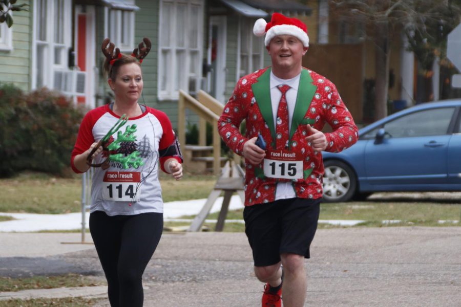 Runners+in+holiday+apparel+participate+in+the+annual+Reindeer+Run+5K+Race+in+downtown+Hammond.+The+annual+marathon+was+held+on+Dec.+7+in+Cate+Square+Park.+