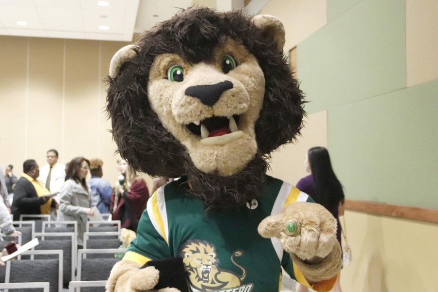 Roomie the Lion poses for a picture with his graduation ring. Graduating seniors received their rings from Dr. John Crain, president of the university, during the Ring Ceremony on Dec. 4. 