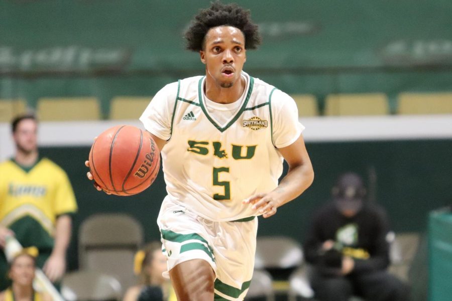 Freshman+guard+Byron+Smith+brings+the+ball+down+court+during+their+game+against+Grambling+State+University.+Smith+finished+the+game+with+four+points%2C+one+steal+and+two+rebounds.+With+Friday%E2%80%99s+79-74+win%2C+the+Lions+sit+at+a+3-6+record.+