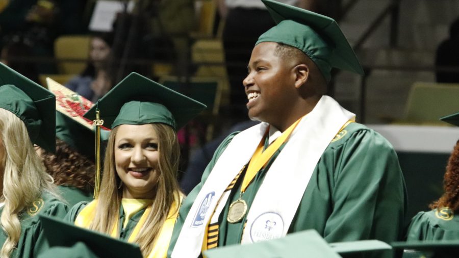 Katlyn+Daigle+and+Richard+Davis+Jr.+graduated+from+the+College+of+Education+during+the+first+Fall+2019+commencement+ceremony.