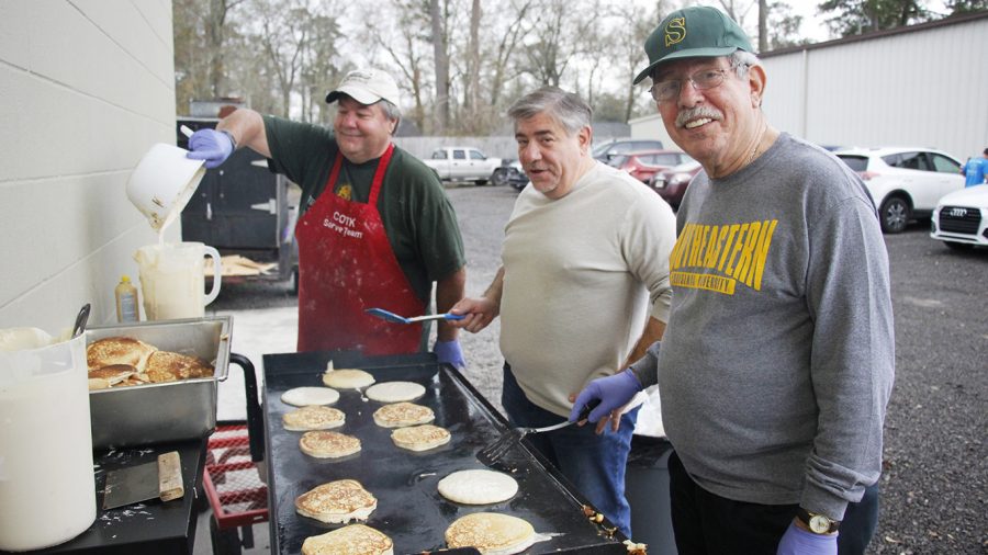 Volunteers at Our Daily Bread prepare food for their third annual Pancake Breakfast Fundraiser. The organization feeds nearly 8,000  people a month, according to Jeff Day, a member of the leadership board.