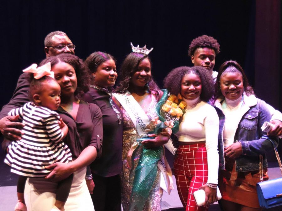 Janine+Hatcher%2C+Miss+Southeastern+2020%2C+is+halfway+through+the+first+semester+of+her+reign.+Pictured+is+Hatcher+with+her+family+backstage+after+being+crowned+at+the+pageant+on+Nov.+22.+