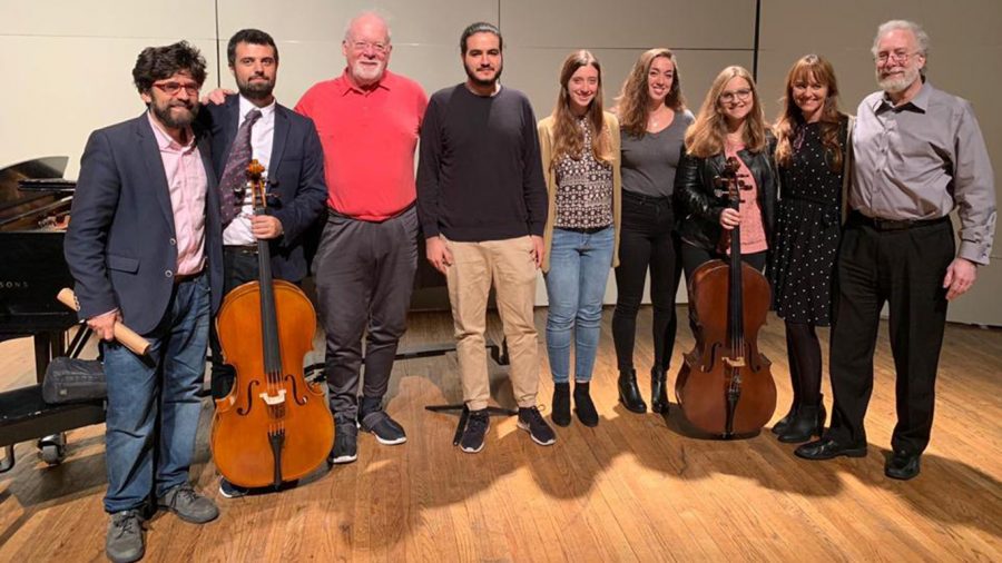 Harrell poses with university students after a masterclass in Daniel Cassin's studio.