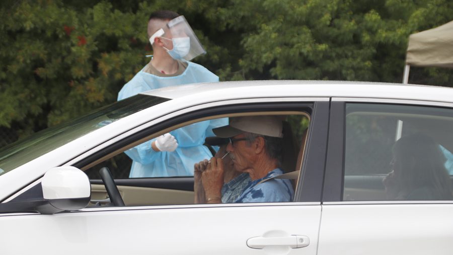 A member of the Louisiana National Guard helps administer the nasal swab test. The free COVID-19 testing at the University Center was organized through a joint collaboration between Tangipahoa Parish Government, Louisiana National Guard and Louisiana Department of Health’s Office of Public Health.