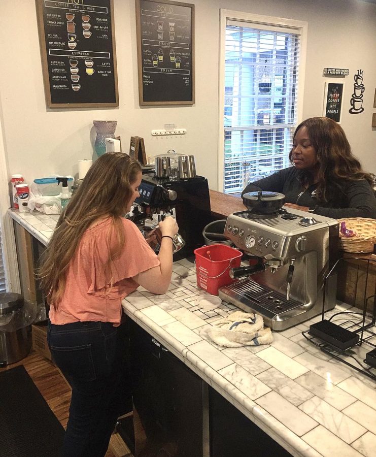 A student orders a coffee at Kairos Koffeehouse; Kairos Koffee serves a variety of beverages, including pastries to it’s customers.