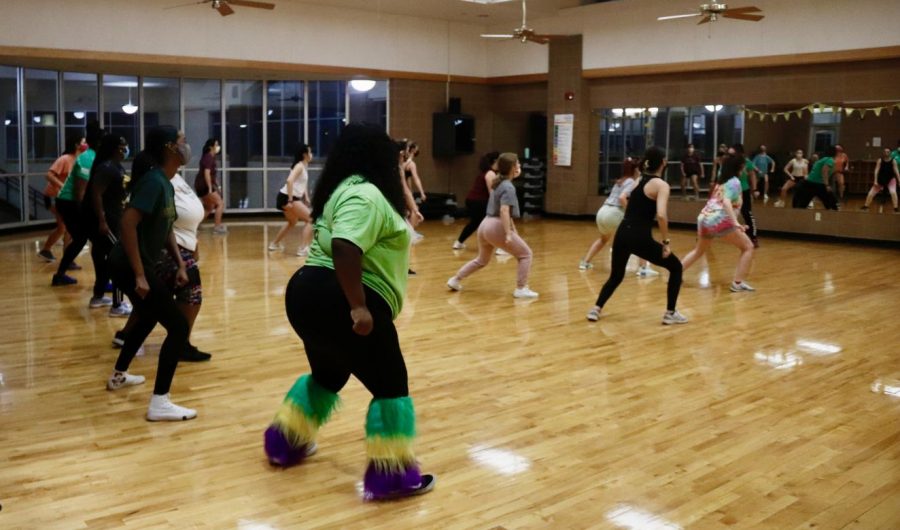 The class was the second annual Mardi Gras-themed fitness class held at the REC. Although the registration capacity limit was 20 people, all the spots for the class were filled.