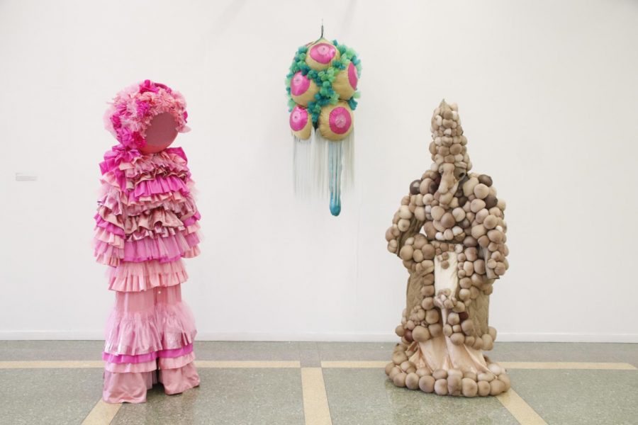 Christine Cook designs costumes for various performing arts, including the costumes pictured above. Her works are currently available for viewing in the Contemporary Art Gallery, along with several other faculty artworks.