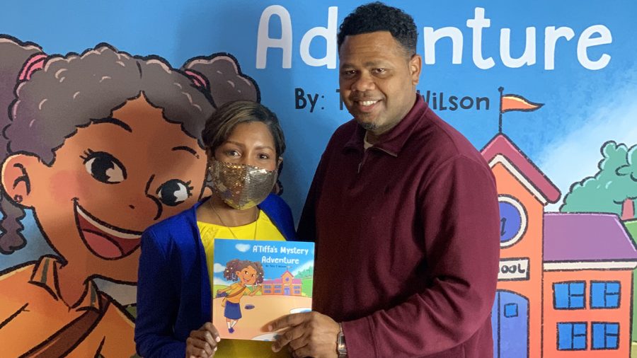 Tyra McGary and her brother Peronous Pete Clark are photographed with McGarys childrens book ATiffas Mystery Adventure. McGary held a book signing and balloon release in memory of her sister ATiffa on Dec. 9, 2020 in TickFaw, La.