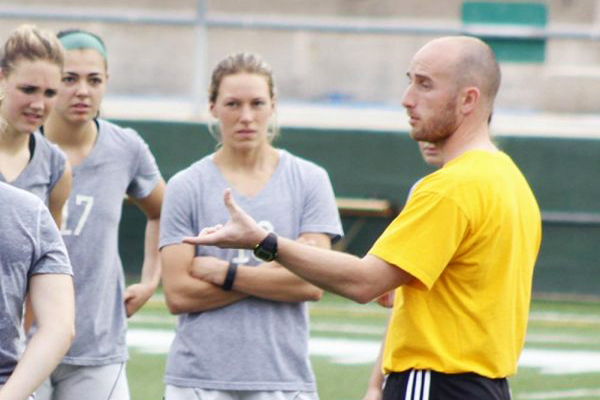 Christopher McBride, pictured on the right, interacting with his players during practice, in his first season at Southeastern. The Lady Lions won the Southland Conference Tournament this year prompting McBride receiving the Coach of the Year award. Southeastern will take on Rutgers on April 27. 