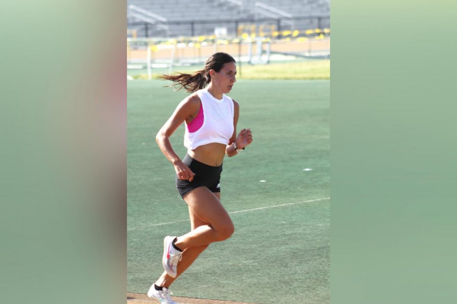 At track practice, Sophie Daigle tries to improve her times and form. She currently has the most records out of any single female track runner in university history.  