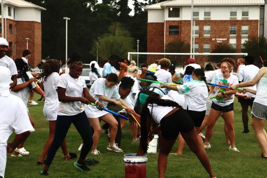On Thursday, Aug. 19, student residents wore white shirts and sprayed one another with paint on Lee Field for the Paint Party as a part of Fall 2021 Welcome Week.